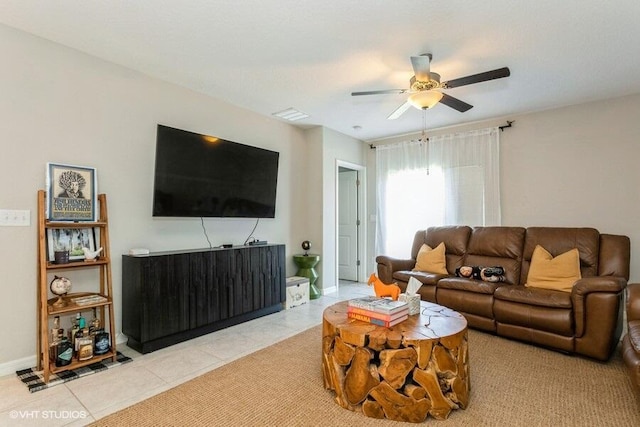 5126 Dandelion St, Apollo Beach, FL 33572 - tiled living room with ceiling fan and baseboards