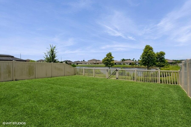 5126 Dandelion St, Apollo Beach, FL 33572 - fenced backyard with a residential view