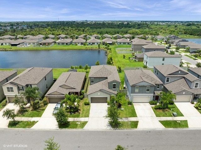 5126 Dandelion St, Apollo Beach, FL 33572 - aerial view of residential area with a large body of water