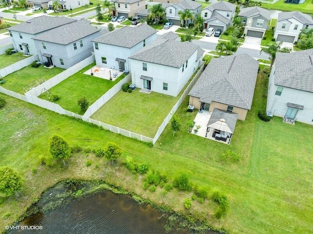 5126 Dandelion St, Apollo Beach, FL 33572 - aerial perspective of suburban area featuring a large body of water