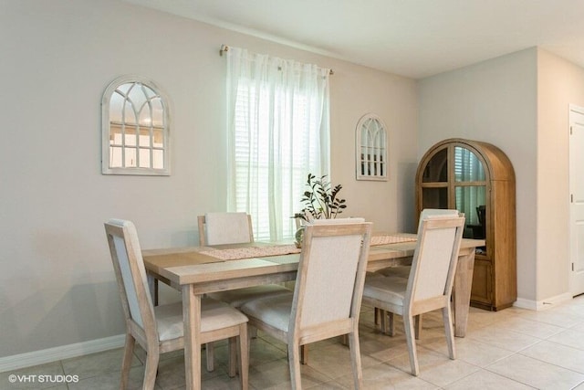 5126 Dandelion St, Apollo Beach, FL 33572 - dining area featuring baseboards and light tile patterned floors