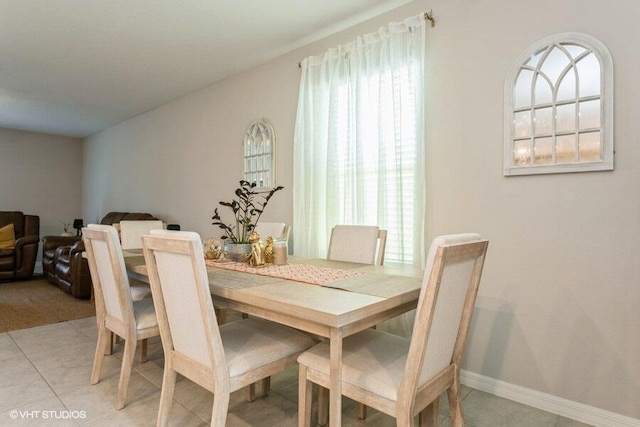 5126 Dandelion St, Apollo Beach, FL 33572 - dining area featuring plenty of natural light and light tile patterned flooring