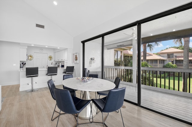19349 Sabal Lake Dr Unit 5046, Boca Raton, FL 33434 - dining space with light wood-type flooring, recessed lighting, and high vaulted ceiling