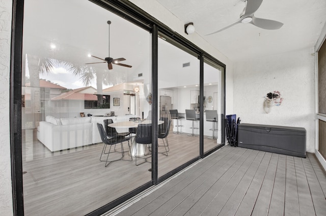 19349 Sabal Lake Dr Unit 5046, Boca Raton, FL 33434 - wooden terrace featuring ceiling fan and outdoor dining area