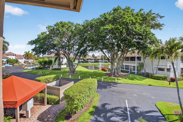 19349 Sabal Lake Dr Unit 5046, Boca Raton, FL 33434 - view of property's community featuring a water view, a residential view, and a yard