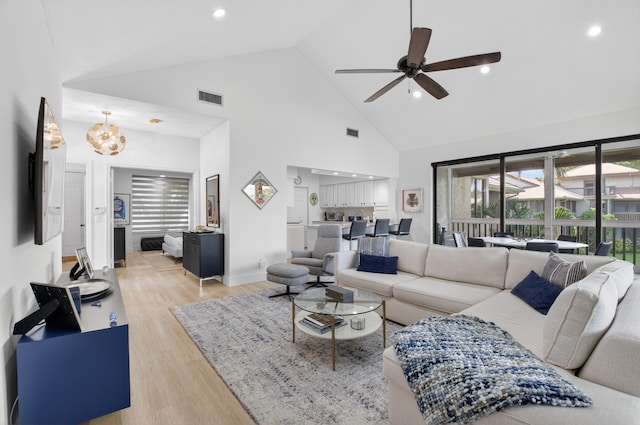 19349 Sabal Lake Dr Unit 5046, Boca Raton, FL 33434 - living area with high vaulted ceiling, light wood-type flooring, a ceiling fan, and recessed lighting