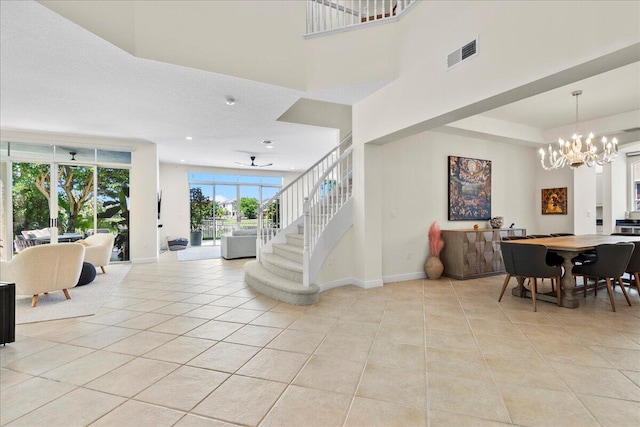9222 Delemar Ct, Wellington, FL 33414 - entryway featuring light tile patterned floors, a chandelier, and recessed lighting