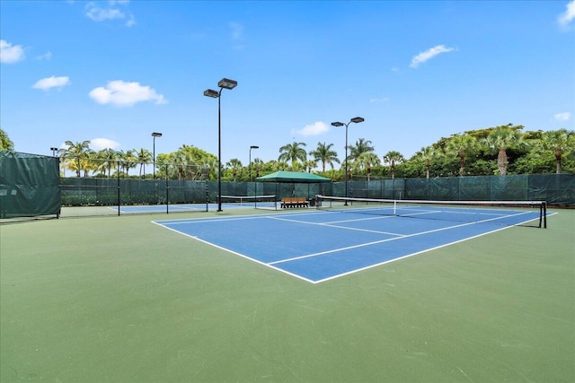 9222 Delemar Ct, Wellington, FL 33414 - view of tennis court featuring community basketball court