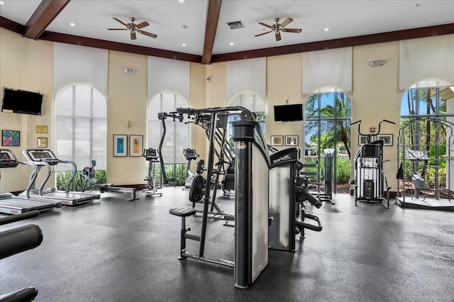 9222 Delemar Ct, Wellington, FL 33414 - workout area with ceiling fan, beamed ceiling, healthy amount of natural light, recessed lighting, and a high ceiling