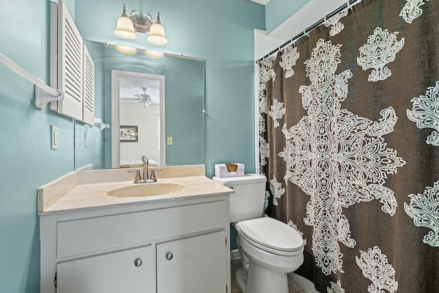 849 SE Celtic Ave, Port Saint Lucie, FL 34983 - full bath featuring vanity, a ceiling fan, and a shower with curtain