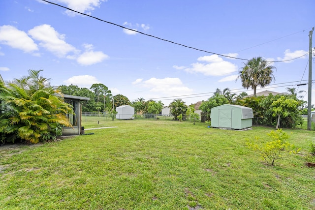 849 SE Celtic Ave, Port Saint Lucie, FL 34983 - view of yard featuring a storage unit