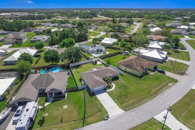 5533 NW Cordrey St, Port Saint Lucie, FL 34986 - aerial overview of property's location featuring nearby suburban area and a pool