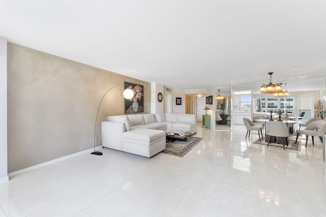4100 Galt Ocean Dr Unit 302, Fort Lauderdale, FL 33308 - living room featuring a chandelier and light tile patterned flooring