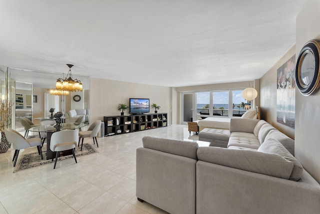 4100 Galt Ocean Dr Unit 302, Fort Lauderdale, FL 33308 - living area featuring light tile patterned floors and a chandelier