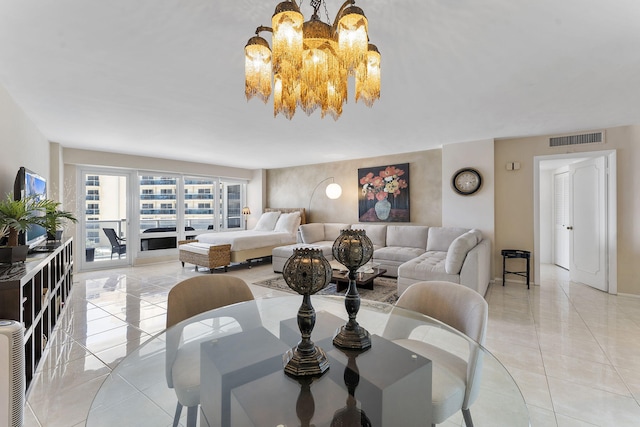 4100 Galt Ocean Dr Unit 302, Fort Lauderdale, FL 33308 - dining room with a chandelier and light tile patterned floors