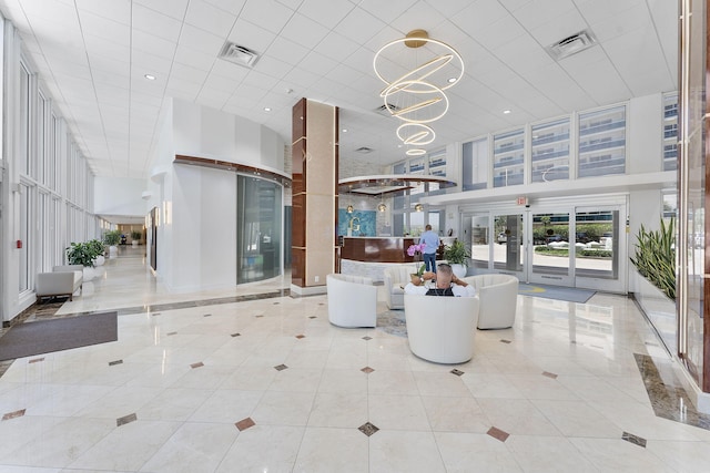 4100 Galt Ocean Dr Unit 302, Fort Lauderdale, FL 33308 - community lobby with a high ceiling and recessed lighting