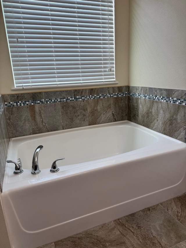 2313 SW Neal Rd, Port Saint Lucie, FL 34953 - bathroom with a garden tub
