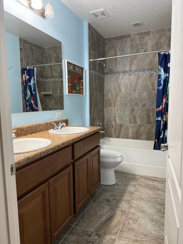 2313 SW Neal Rd, Port Saint Lucie, FL 34953 - bathroom featuring a textured ceiling, double vanity, and shower / bath combo with shower curtain