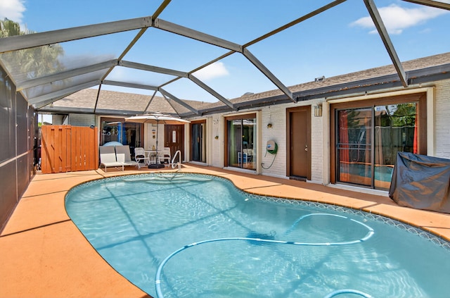 9927 Boca Gardens Trl Unit A, Boca Raton, FL 33496 - swimming pool featuring a patio and glass enclosure