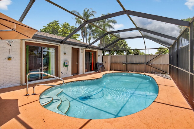 9927 Boca Gardens Trl Unit A, Boca Raton, FL 33496 - view of swimming pool with glass enclosure and a patio