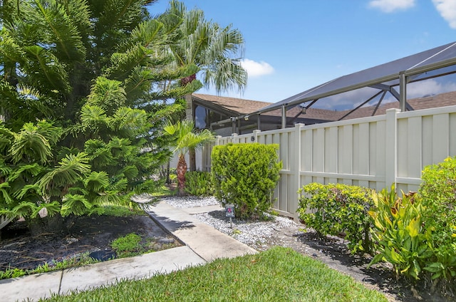 9927 Boca Gardens Trl Unit A, Boca Raton, FL 33496 - view of yard featuring a lanai