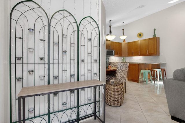9927 Boca Gardens Trl Unit A, Boca Raton, FL 33496 - interior space featuring lofted ceiling and light tile patterned floors