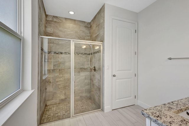 774 SE Ablett Ln, Port Saint Lucie, FL 34984 - full bathroom featuring a stall shower, vanity, and recessed lighting