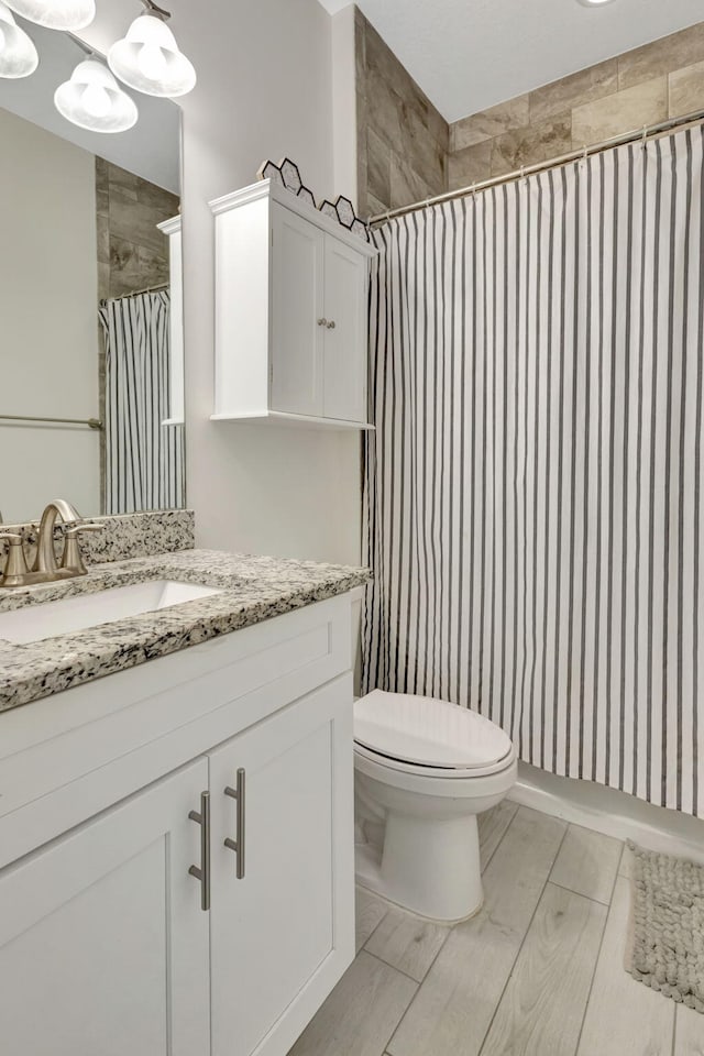 774 SE Ablett Ln, Port Saint Lucie, FL 34984 - bathroom featuring vanity and a shower with curtain
