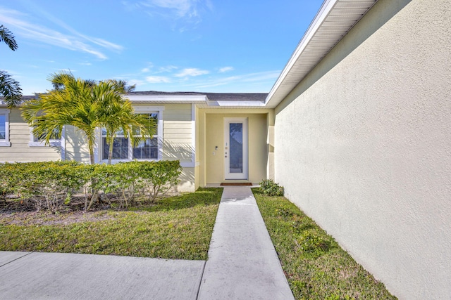 774 SE Ablett Ln, Port Saint Lucie, FL 34984 - entrance to property with stucco siding