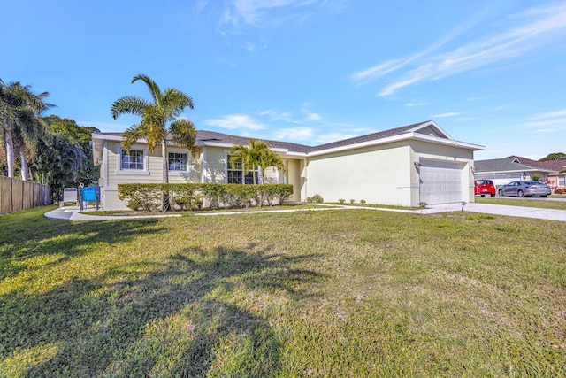 774 SE Ablett Ln, Port Saint Lucie, FL 34984 - single story home with a garage, concrete driveway, and stucco siding