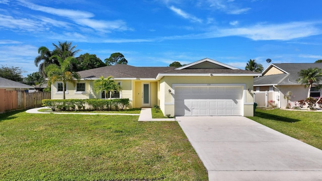 774 SE Ablett Ln, Port Saint Lucie, FL 34984 - ranch-style home featuring an attached garage, stucco siding, and concrete driveway