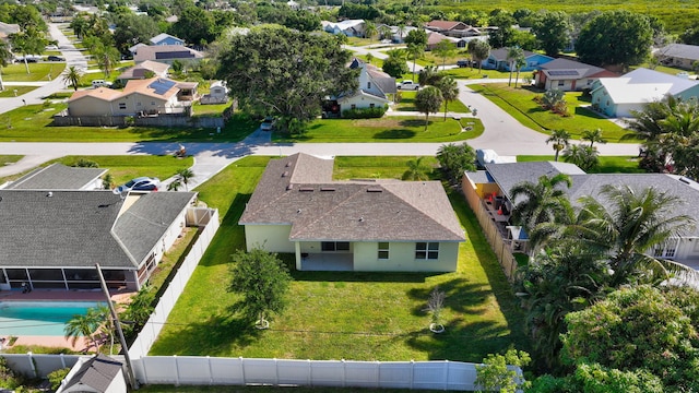 774 SE Ablett Ln, Port Saint Lucie, FL 34984 - aerial perspective of suburban area with a pool area