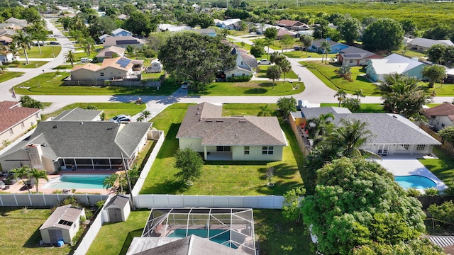 774 SE Ablett Ln, Port Saint Lucie, FL 34984 - aerial perspective of suburban area with a pool