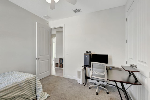 774 SE Ablett Ln, Port Saint Lucie, FL 34984 - carpeted bedroom with arched walkways, an office area, and ceiling fan