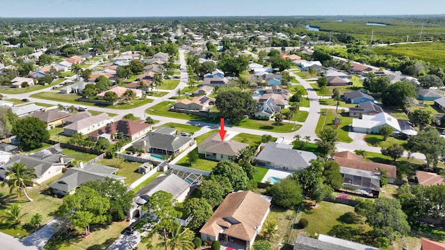 774 SE Ablett Ln, Port Saint Lucie, FL 34984 - aerial overview of property's location with nearby suburban area