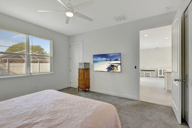 774 SE Ablett Ln, Port Saint Lucie, FL 34984 - carpeted bedroom featuring baseboards and ceiling fan