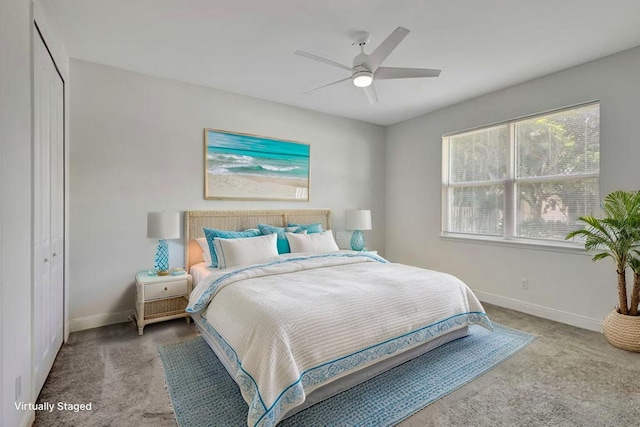774 SE Ablett Ln, Port Saint Lucie, FL 34984 - carpeted bedroom featuring a closet and ceiling fan