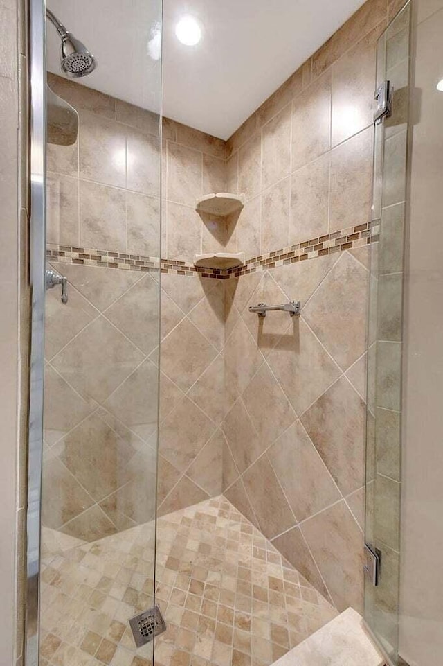 74 Normandy Unit B, Delray Beach, FL 33484 - bathroom with a shower stall and recessed lighting