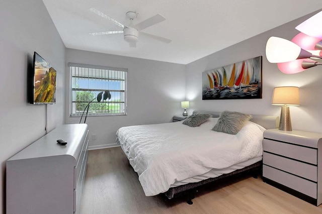 74 Normandy Unit B, Delray Beach, FL 33484 - bedroom featuring wood finished floors and a ceiling fan