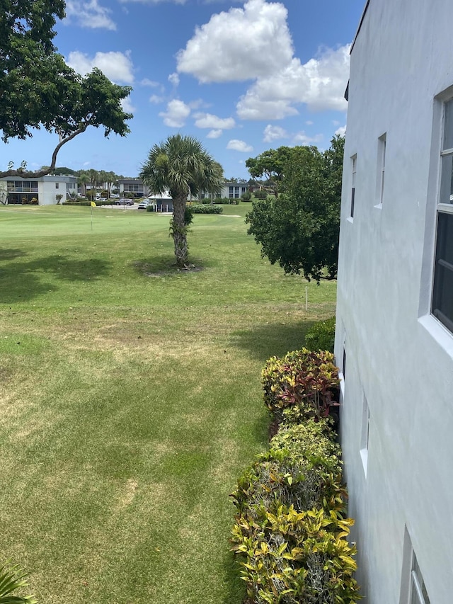 74 Normandy Unit B, Delray Beach, FL 33484 - view of grassy yard