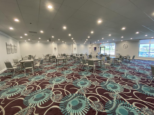 74 Normandy Unit B, Delray Beach, FL 33484 - miscellaneous room with carpet flooring, healthy amount of natural light, recessed lighting, and crown molding