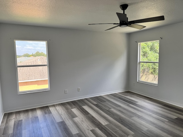 1965 SW Bellevue Ave, Port Saint Lucie, FL 34953 - spare room with dark wood-style flooring, a textured ceiling, and ceiling fan