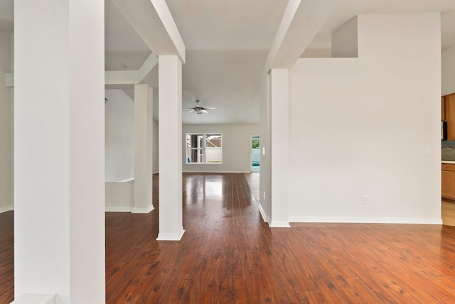 1901 SW Diamond St, Port Saint Lucie, FL 34953 - hallway with dark wood finished floors and baseboards