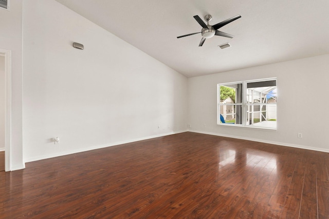 1901 SW Diamond St, Port Saint Lucie, FL 34953 - spare room with vaulted ceiling, a ceiling fan, and dark wood-style flooring