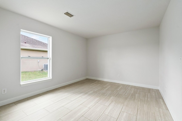 1901 SW Diamond St, Port Saint Lucie, FL 34953 - spare room with plenty of natural light and wood finished floors