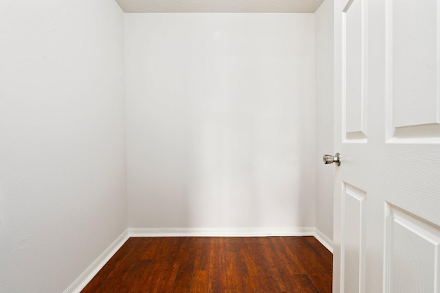 1901 SW Diamond St, Port Saint Lucie, FL 34953 - spare room with dark wood finished floors and baseboards