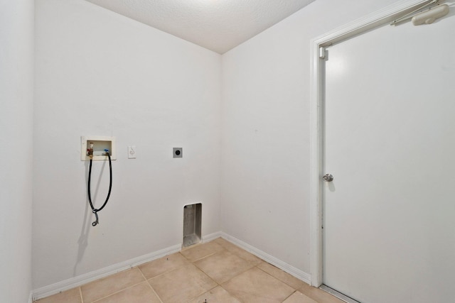 1901 SW Diamond St, Port Saint Lucie, FL 34953 - laundry room featuring washer hookup, hookup for an electric dryer, and light tile patterned flooring