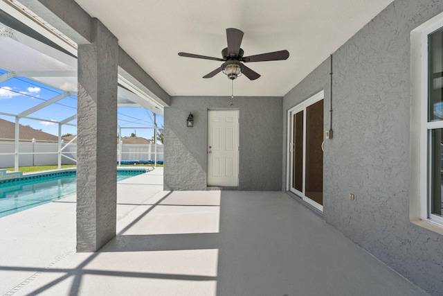 1901 SW Diamond St, Port Saint Lucie, FL 34953 - view of patio with ceiling fan and glass enclosure