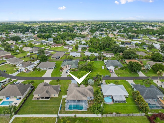 1901 SW Diamond St, Port Saint Lucie, FL 34953 - aerial perspective of suburban area featuring a pool area