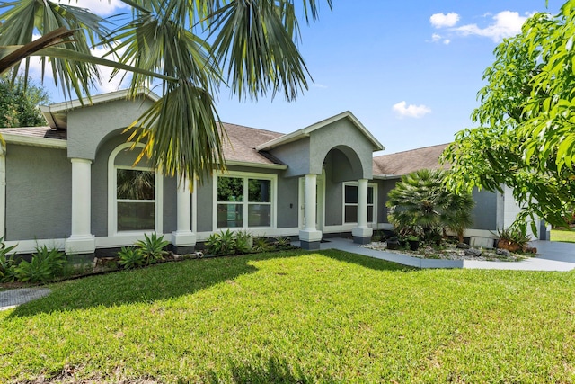 1901 SW Diamond St, Port Saint Lucie, FL 34953 - ranch-style home featuring stucco siding and a front yard